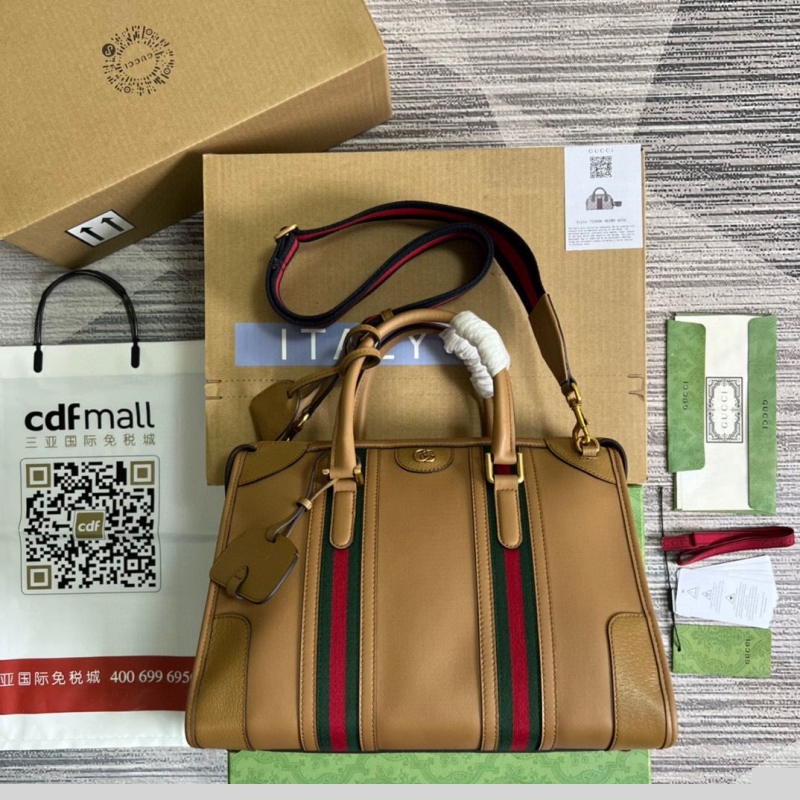 G*u*i top handle bags